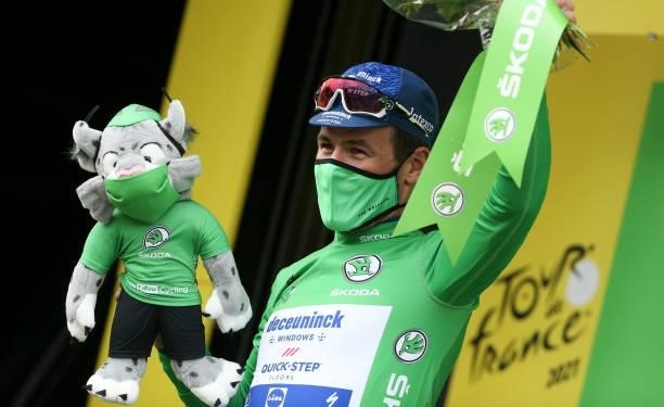 Mark Cavendish of Great Britain and Deceuninck - Quick Step retains the green jersey of best sprinter during the trophy ceremony of stage 8 of the...