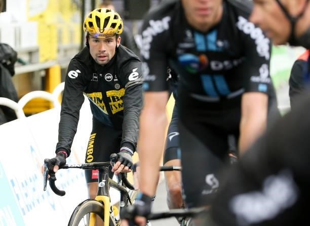 Primoz Roglic of Slovenia and Jumbo - Visma crosses the finish line during stage 8 of the 108th Tour de France 2021, a stage of 151 km between...