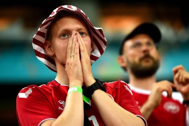 Denmark fan watches the game during the UEFA Euro 2020 Championship Quarter-final match between Czech Republic and Denmark at Baku Olimpiya Stadionu...