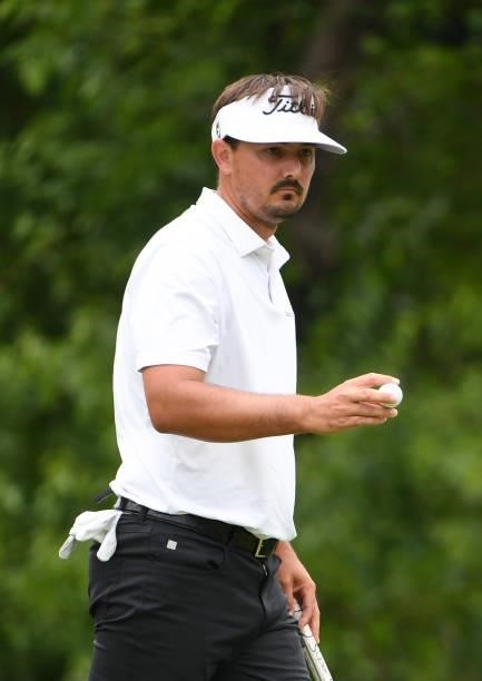 Hank Lebioda reacts to his putt on the eighth green during the third round of the Rocket Mortgage Classic on July 03, 2021 at the Detroit Golf Club...