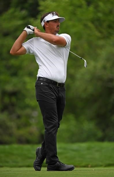 Hank Lebioda plays his shot from the ninth tee during the third round of the Rocket Mortgage Classic on July 03, 2021 at the Detroit Golf Club in...