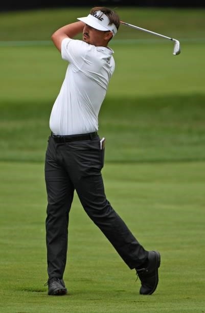 Hank Lebioda plays his shot on the sixth hole during the third round of the Rocket Mortgage Classic on July 03, 2021 at the Detroit Golf Club in...