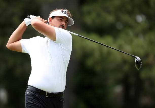 Hank Lebioda plays his shot from the fourth tee during the third round of the Rocket Mortgage Classic on July 03, 2021 at the Detroit Golf Club in...