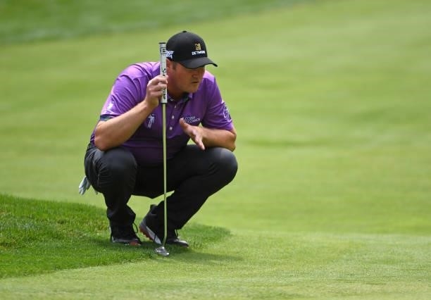 Jason Kokrak lines up a putt on the fourth green during the third round of the Rocket Mortgage Classic on July 03, 2021 at the Detroit Golf Club in...