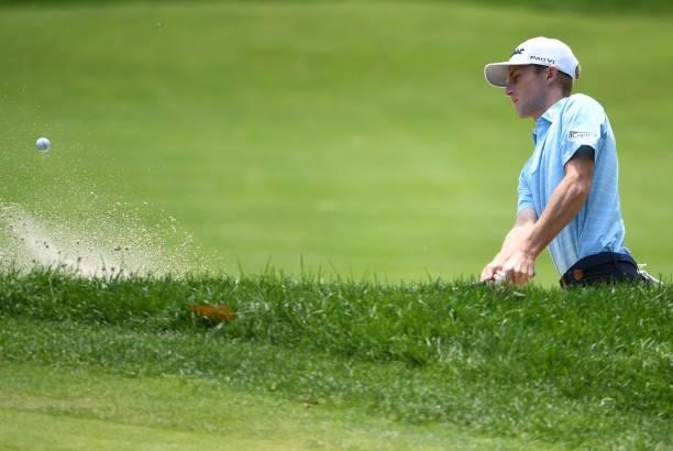 Will Zalatoris plays a shot from a bunker on the fourth hole during the third round of the Rocket Mortgage Classic on July 03, 2021 at the Detroit...