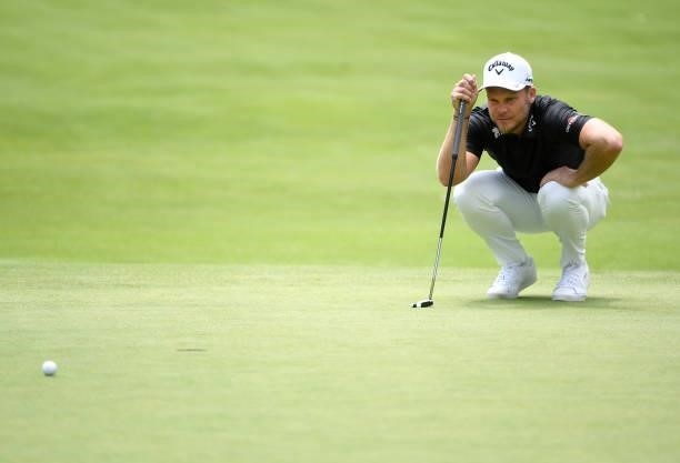 Danny Willett of England lines up a putt during the third round of the Rocket Mortgage Classic on July 03, 2021 at the Detroit Golf Club in Detroit,...