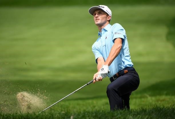 Will Zalatoris plays a shot from a bunker on the sixth hole during the third round of the Rocket Mortgage Classic on July 03, 2021 at the Detroit...