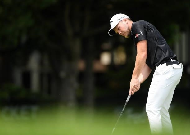 Danny Willett of England putts on the sixth hole during the third round of the Rocket Mortgage Classic on July 03, 2021 at the Detroit Golf Club in...