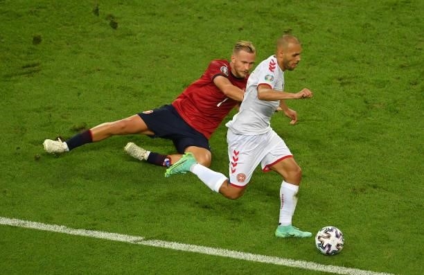 Martin Braithwaite of Denmark runs with the ball whilst under pressure from Antonin Barak of Czech Republic during the UEFA Euro 2020 Championship...