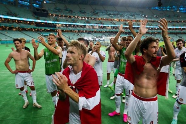Players of Denmark celebrate their side's victory in front of the fans after the UEFA Euro 2020 Championship Quarter-final match between Czech...