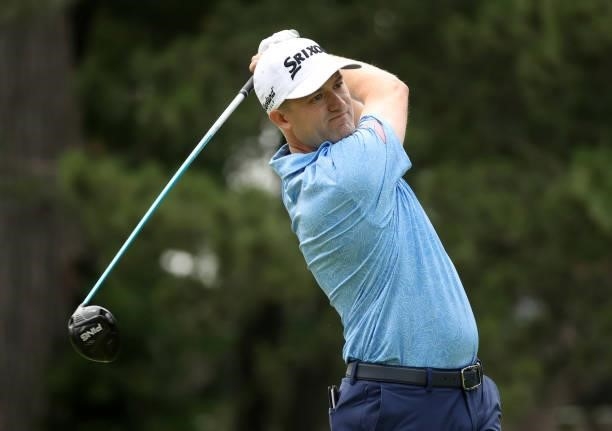 Russell Knox of Scotland plays his shot from the fourth tee during the third round of the Rocket Mortgage Classic on July 03, 2021 at the Detroit...