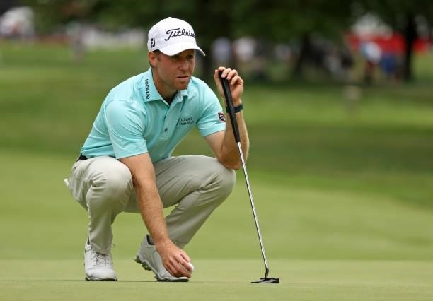 Tyler Duncan lines up a putt on the third green during the third round of the Rocket Mortgage Classic on July 03, 2021 at the Detroit Golf Club in...