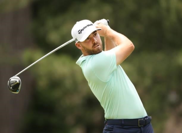 Matthew Wolff plays his shot from the fourth tee during the third round of the Rocket Mortgage Classic on July 03, 2021 at the Detroit Golf Club in...