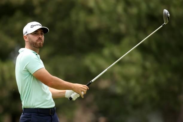 Matthew Wolff plays his shot from the fourth tee during the third round of the Rocket Mortgage Classic on July 03, 2021 at the Detroit Golf Club in...