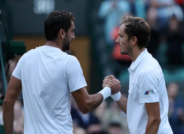Daniil Medvedev of Russia shakes hands with Marin Cilic of Croatia after winning their men's singles third round match during Day Six of The...