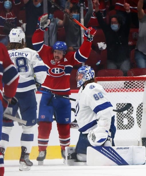 Brendan Gallagher of the Montreal Canadiens celebrates a Canadiens goal against Andrei Vasilevskiy of the Tampa Bay Lightning during Game Three of...