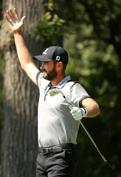 Troy Merritt reacts to a hole in one on the 11th tee during the third round of the Rocket Mortgage Classic on July 03, 2021 at the Detroit Golf Club...