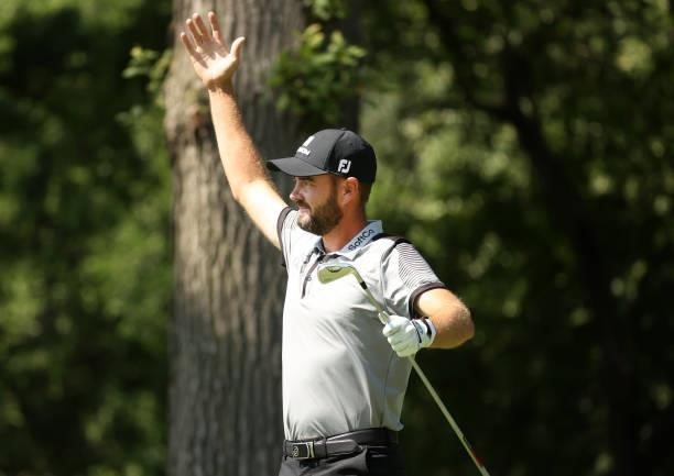Troy Merritt reacts to a hole in one on the 11th tee during the third round of the Rocket Mortgage Classic on July 03, 2021 at the Detroit Golf Club...