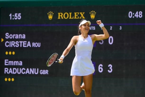 Emma Raducanu of Great Britain celebrates during her match against Sorana Cirstea of Romania in the third round of the ladies singles during Day Six...