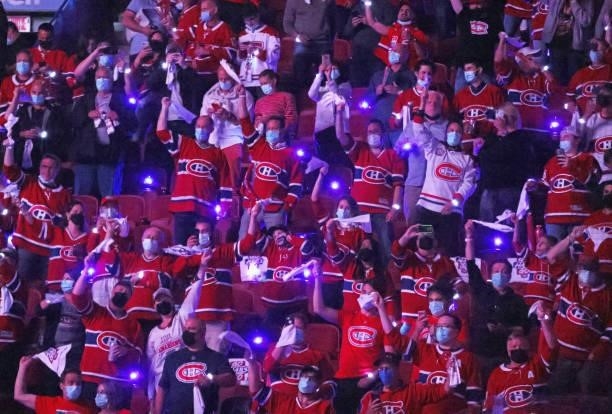 Fans attend the game between the Tampa Bay Lightning and the Montreal Canadiens during Game Three of the 2021 NHL Stanley Cup Final at the Bell...