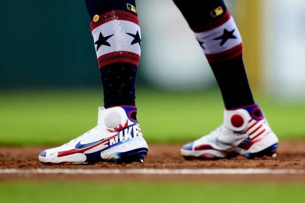 Detailed view of the patriotic cleats and socks of Jonathan India of the Cincinnati Reds during a game between the Chicago Cubs and Cincinnati Reds...
