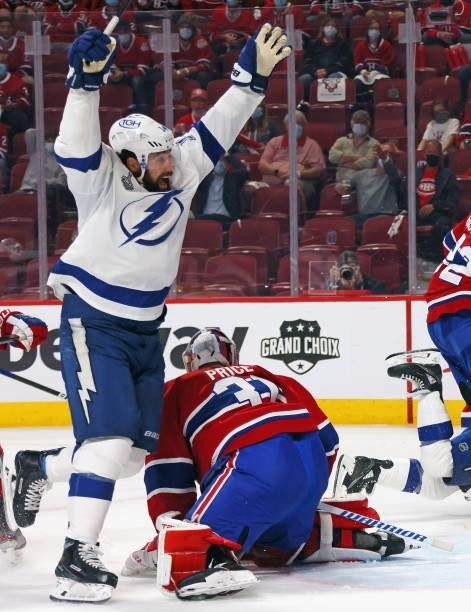 Pat Maroon of the Tampa Bay Lightning celebrates a goal by Tyler Johnson against Carey Price of the Montreal Canadiens during Game Three of the 2021...