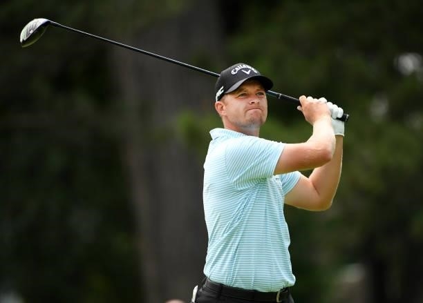 Tom Lewis of England plays his shot from the fourth tee during the third round of the Rocket Mortgage Classic on July 03, 2021 at the Detroit Golf...