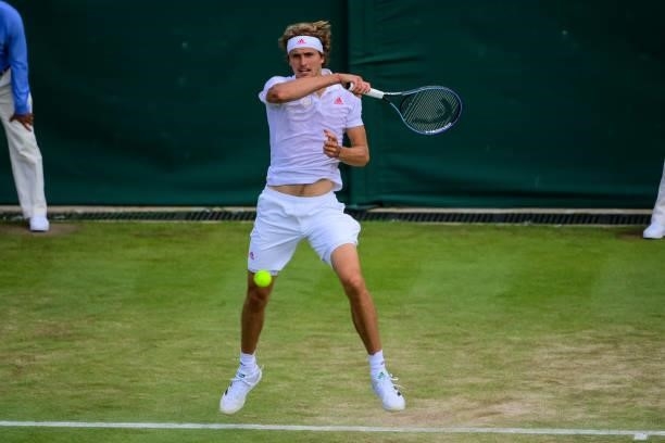 Alexander Zverev of Germany hits a forehand against Taylor Fritz of the United States in the third round of the gentlemen's singles during Day Six of...