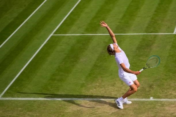 Alexander Zverev of Germany serves against Taylor Fritz of the United States in the third round of the gentlemen's singles during Day Six of The...