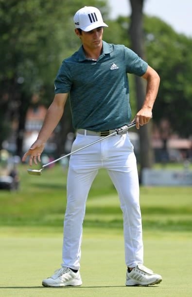 Joaquin Niemann of Chile reacts to his putt on the fifth hole during the third round of the Rocket Mortgage Classic on July 03, 2021 at the Detroit...