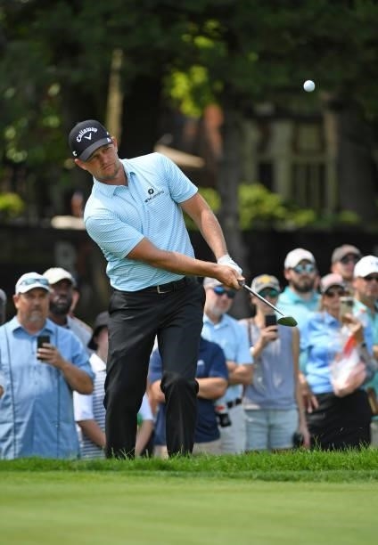 Tom Lewis of England chips onto the sixth green during the third round of the Rocket Mortgage Classic on July 03, 2021 at the Detroit Golf Club in...