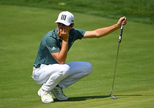 Joaquin Niemann of Chile waits to putt on the ninth green during the third round of the Rocket Mortgage Classic on July 03, 2021 at the Detroit Golf...