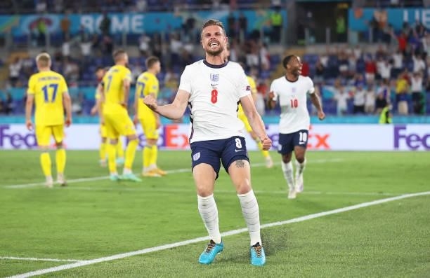 Jordan Henderson of England celebrates after scoring their side's fourth goal during the UEFA Euro 2020 Championship Quarter-final match between...