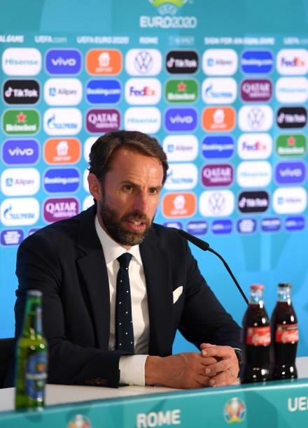In this handout picture provided by UEFA, Gareth Southgate, Head Coach of England speaks to the media during the England Press Conference after the...