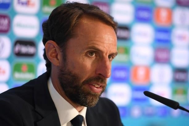 In this handout picture provided by UEFA, Gareth Southgate, Head Coach of England speaks to the media during the England Press Conference after the...