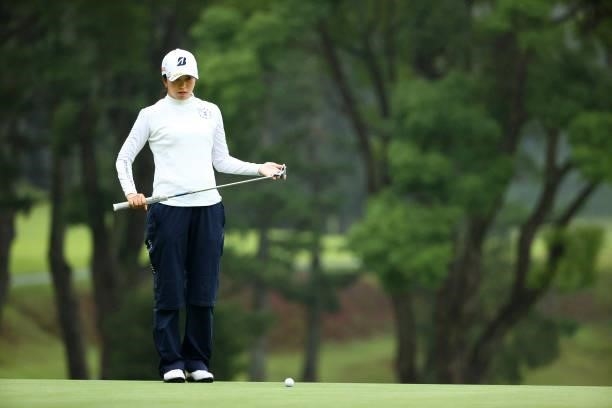 Kotone Hori of Japan lines up a putt on the 17th green during the rest of the third round of the Shiseido Ladies Open at Totsuka Country Club on July...