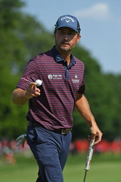 Kevin Kisner reacts to his putt on the 17th green during the third round of the Rocket Mortgage Classic on July 03, 2021 at the Detroit Golf Club in...