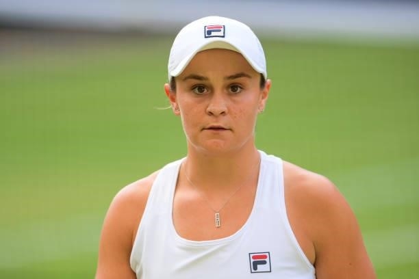 Ashleigh Barty of Australia waits for the ball kids to throw her balls for her serve against Katerina Siniakova of the Czech Republic in the third...
