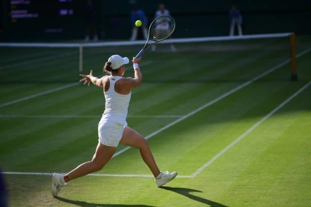 Ashleigh Barty of Australia hits a forehand against Katerina Siniakova of the Czech Republic in the third round of the ladies singles during Day Six...