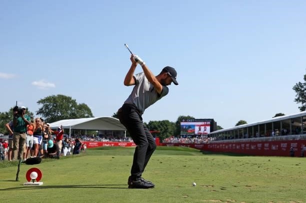 Troy Merritt plays his shot from the 15th tee during the third round of the Rocket Mortgage Classic on July 03, 2021 at the Detroit Golf Club in...