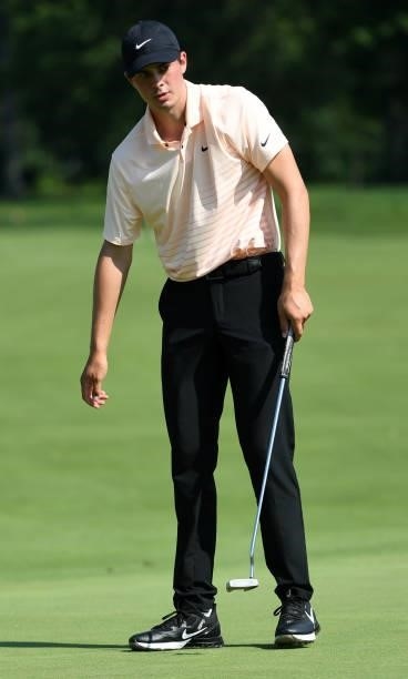 Davis Thompson reacts to a missed putt on the 17th hole during the third round of the Rocket Mortgage Classic on July 03, 2021 at the Detroit Golf...