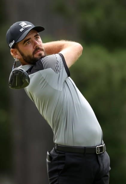 Troy Merritt plays his shot from the fourth tee during the third round of the Rocket Mortgage Classic on July 03, 2021 at the Detroit Golf Club in...