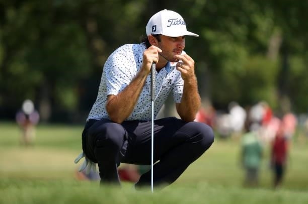 Max Homa lines up a putt on the 13th green during the third round of the Rocket Mortgage Classic on July 03, 2021 at the Detroit Golf Club in...