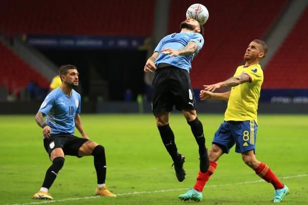 Nahitan Nandez of Uruguay heads the ball against Gustavo Cuellar of Colombia during a quarter-final match of Copa America Brazil 2021 between...