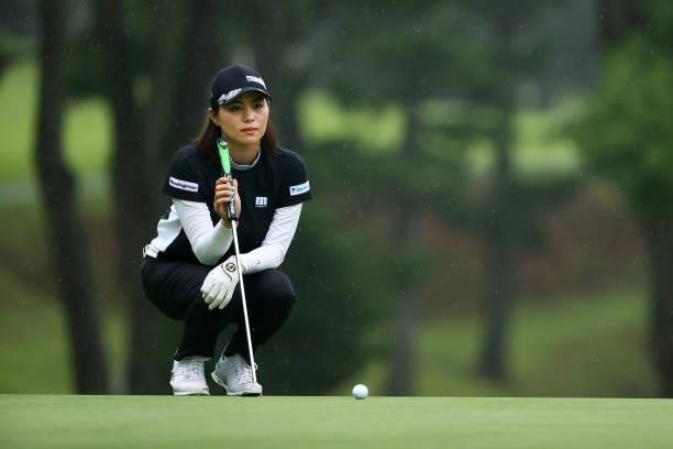 Hina Arakaki of Japan lines up a putt on the 17th green during the rest of the third round of the Shiseido Ladies Open at Totsuka Country Club on...