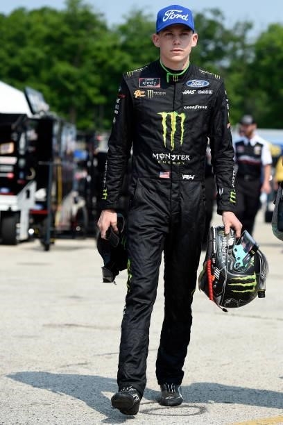 Riley Herbst, driver of the Monster Energy Ford, walks the grid during the NASCAR Xfinity Series Henry 180 at Road America on July 03, 2021 in...