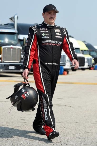 Brett Moffitt, driver of the Our Motorsports Chevrolet, walks the grid during the NASCAR Xfinity Series Henry 180 at Road America on July 03, 2021 in...