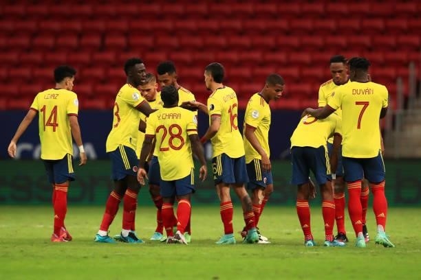Davinson Sanchez of Colombia reacts with teammates in the penalty shootout after a quarter-final match of Copa America Brazil 2021 between Colombia...