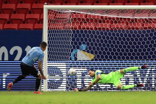 Jose Gimenez of Uruguay misses his penalty kick as David Ospina of Colombia dives to make a save in the shootout after a quarter-final match of Copa...