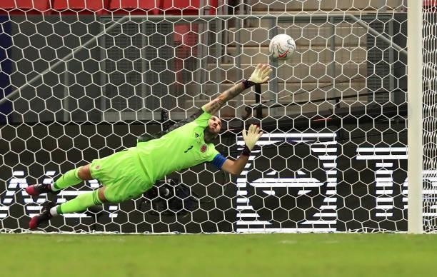 David Ospina of Colombia dives to make a save in a penalty shootout after a quarter-final match of Copa America Brazil 2021 between Colombia and...